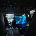 Ordinateur Classe V ciel étoilé en fond